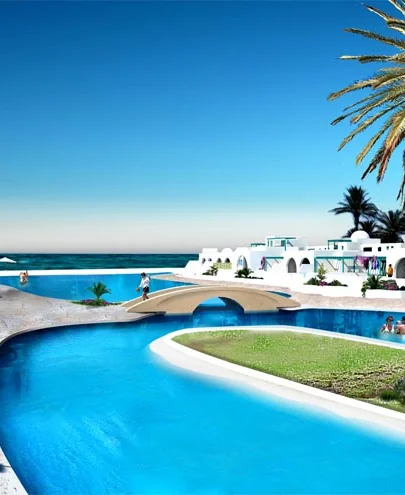 Le lagon du village Djerba-Afous, sa passerelle et les maisons blanches